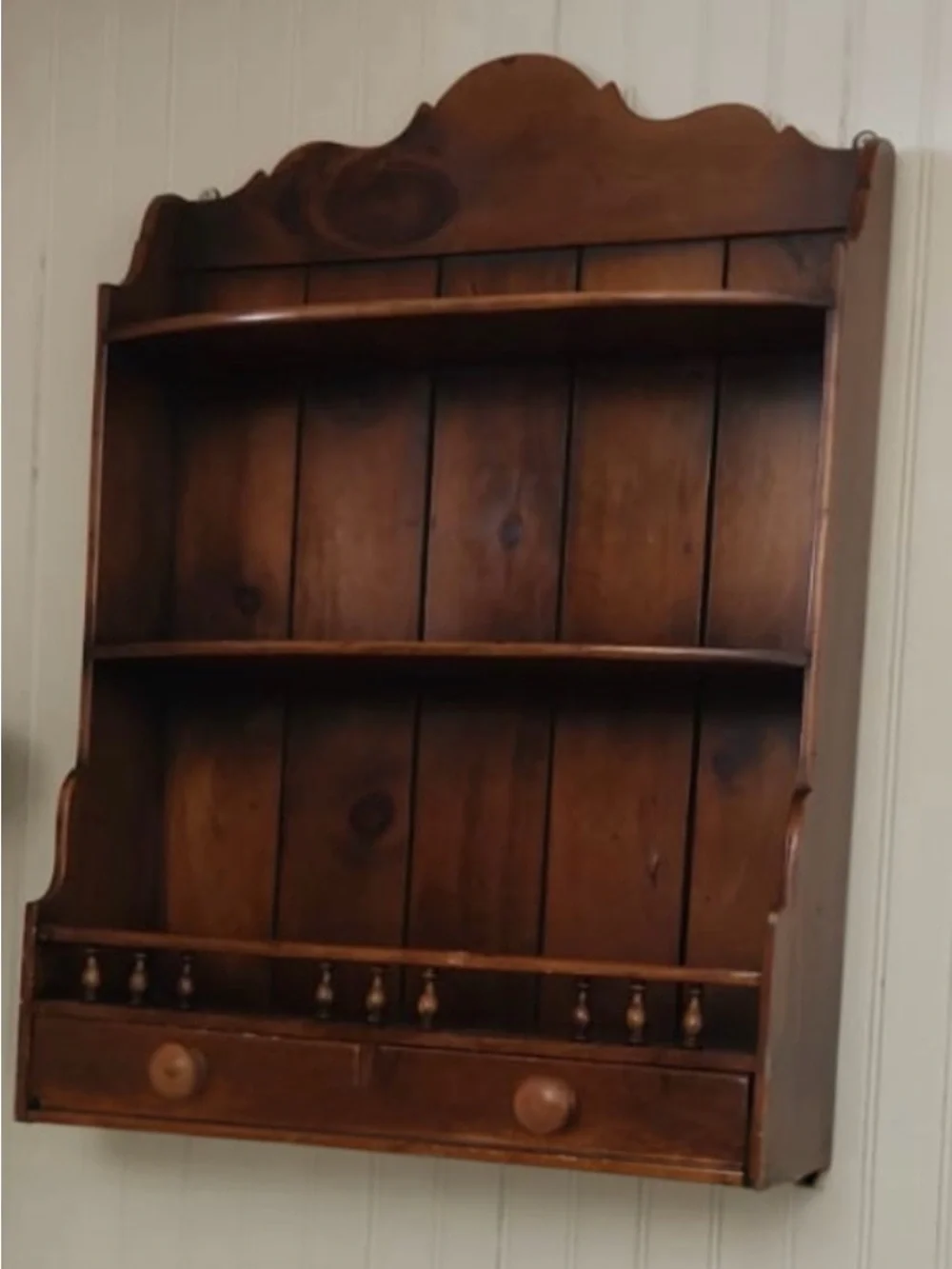 Vintage distressed wood wall shelf.